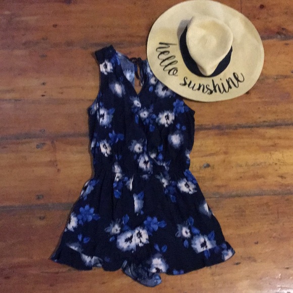 Forever 21 Pants - Floral sleeveless romper with ties in back